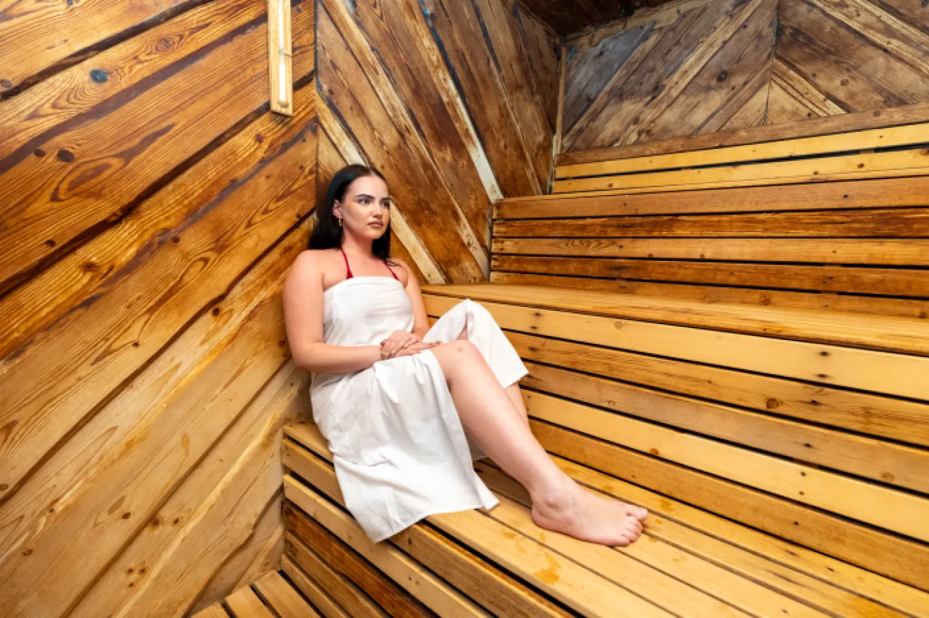A woman relaxing in the sauna
